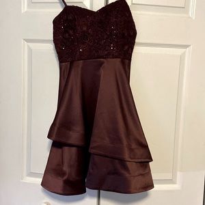 Purple lace top with think material bottom.